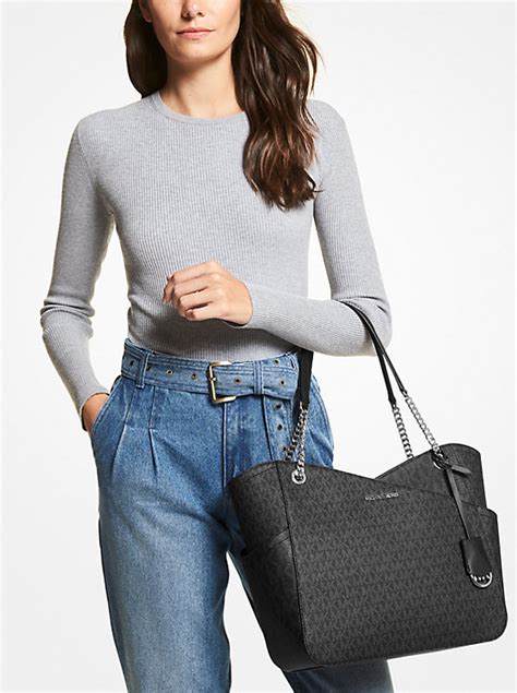 michael kors jet set bag silver|More.